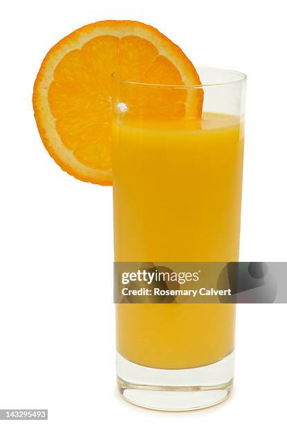 freshly squeezed orange juice in a tall glass - full english breakfast stock pictures, royalty-free photos & images