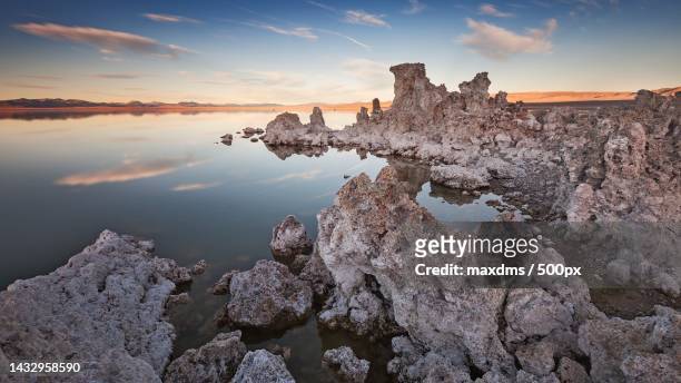 scenic view of sea against sky during sunset - tufa stock pictures, royalty-free photos & images