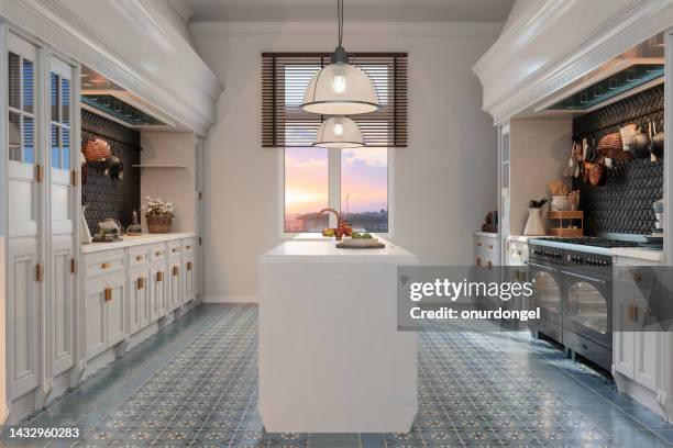 interior de cocina moderna con gabinetes blancos, isla de cocina y vista al atardecer a través de la ventana - neoclásico fotografías e imágenes de stock