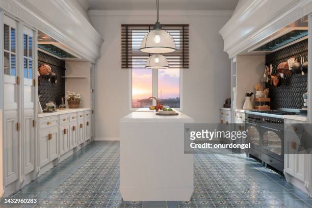 modern kitchen interior with white cabinets, kitchen island and sunset view through the window - geometrical architecture stock pictures, royalty-free photos & images