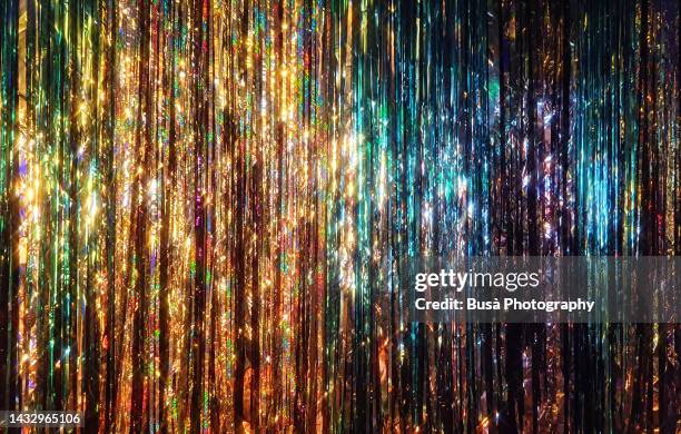 colorful tinsel glitter curtain - affascinante foto e immagini stock