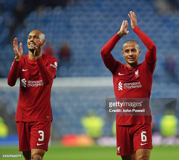 Fabinho of Liverpool and Thiago Alcantara of Liverpool at the end of the UEFA Champions League group A match between Rangers FC and Liverpool FC at...