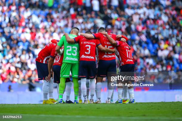 Players of chivas huddle before the playoff match between Puebla and Chivas as part of the Torneo Apertura 2022 Liga MX at Cuauhtemoc Stadium on...