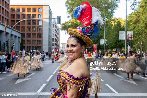 Women in traditional South American dress dance during the demonstration against Hispanic Day on October 12, 2022 in Madrid, Spain. Spain's National...