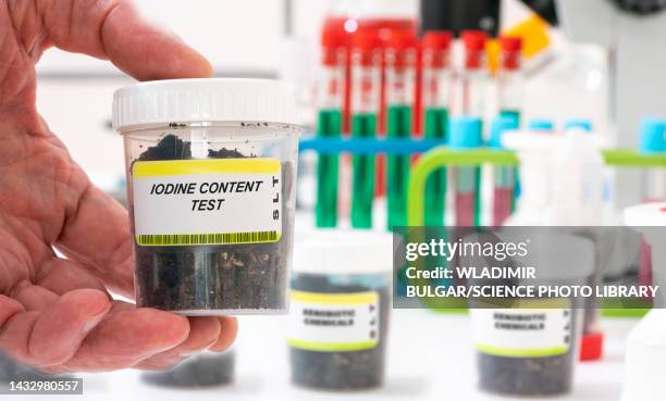 iodine content test in a soil sample - iodine stock pictures, royalty-free photos & images