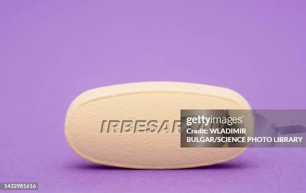 irbesartan pill, conceptual image - angiotensin stock pictures, royalty-free photos & images