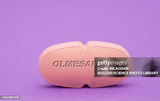 olmesartan pill, conceptual image - angiotensin stock pictures, royalty-free photos & images