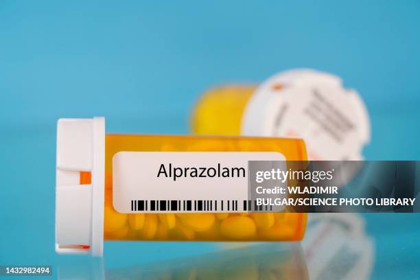 alprazolam pill bottle, conceptual image - alprazolam stock-fotos und bilder