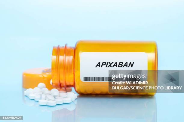 apixaban pill bottle, conceptual image - anticoagulant stock-fotos und bilder