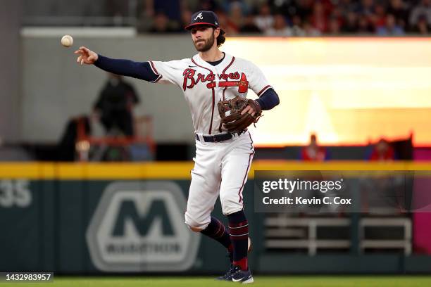 Dansby Swanson of the Atlanta Braves throws to first base against the Philadelphia Phillies during the third inning in game two of the National...