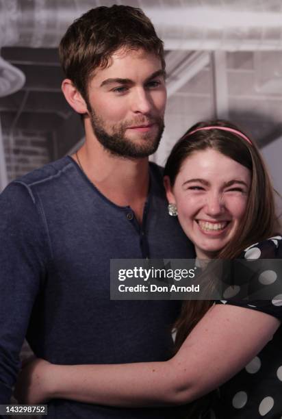 American actor, Chace Crawford poses for photos with fans at the Diet Coke pop-up photo set in Martin Place on April 23, 2012 in Sydney, Australia.