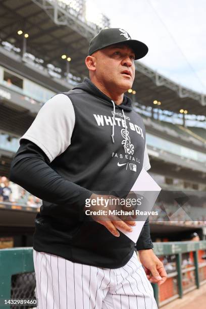 Acting manager Miguel Cairo of the Chicago White Sox walks the lineup card out prior to the game against the Minnesota Twins at Guaranteed Rate Field...
