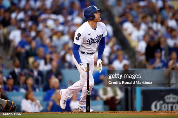 Freddie Freeman of the Los Angeles Dodgers watches his solo home run in the first inning during game two of the National League Division Series...