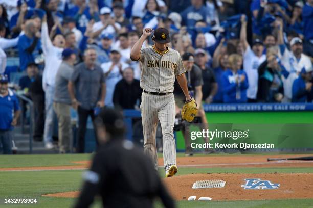 Yu Darvish of the San Diego Padres reacts after giving up a solo home run to Freddie Freeman of the Los Angeles Dodgers in the first inning in game...