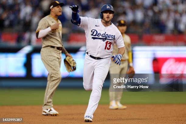 Max Muncy of the Los Angeles Dodgers celebrates his solo home run in the second inning in game two of the National League Division Series against the...