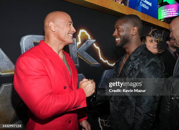 Dwayne "The Rock" Johnson and Aldis Hodge attend DC's "Black Adam" New York Premiere at AMC Empire 25 on October 12, 2022 in New York City.