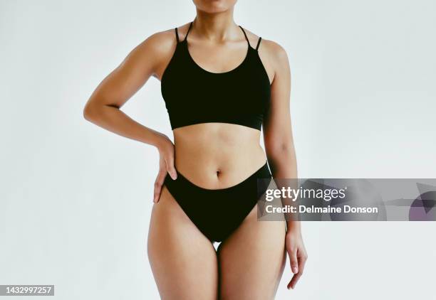 model, bikini and studio for plus size photoshoot in fashion, magazine or blog on the web. woman, body positivity and lingerie with grey background for underwear, marketing and advertising commercial - beautiful voluptuous women stock pictures, royalty-free photos & images