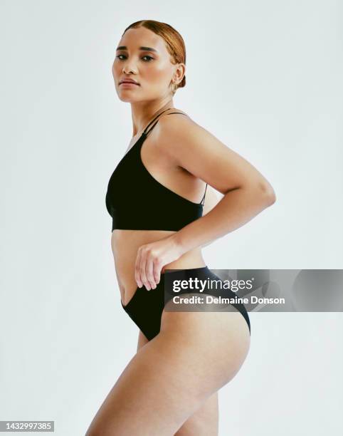 body, underwear and curvy model in studio for self love, empowerment and positive mindset. portrait of young, confident and beautiful woman from mexico embracing her body positivity and natural skin. - bra 個照片及圖片檔