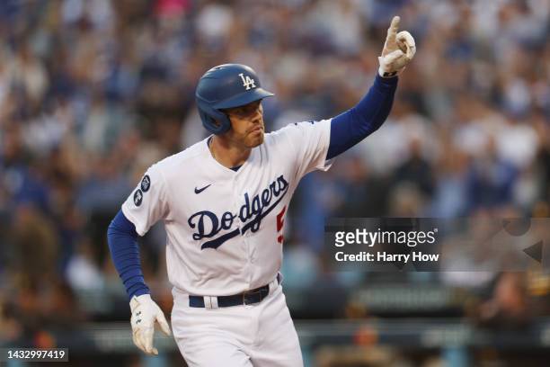 Freddie Freeman of the Los Angeles Dodgers celebrates his solo home run in the first inning in game two of the National League Division Series...