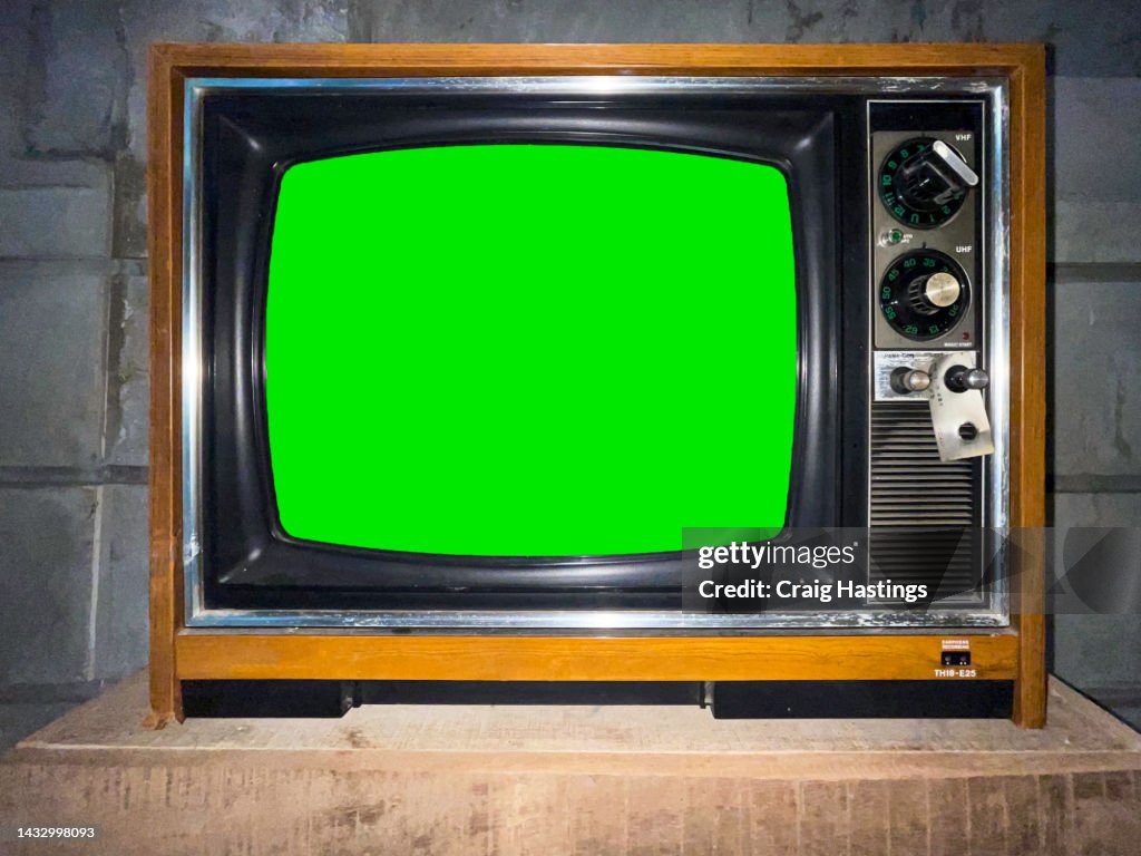 Old Vintage TV Television set with Green Screen Chroma Key background.