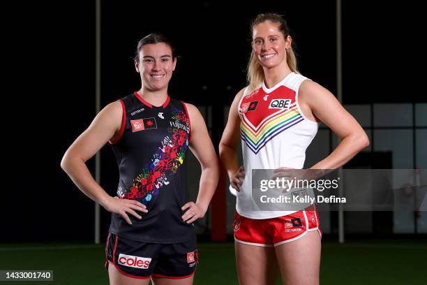 Bonnie Toogood of the Bombers and Alice Mitchell of the Swans pose for a portrait during the 2022 AFLW Pride Round Launch at Ikon Park on October 13,...