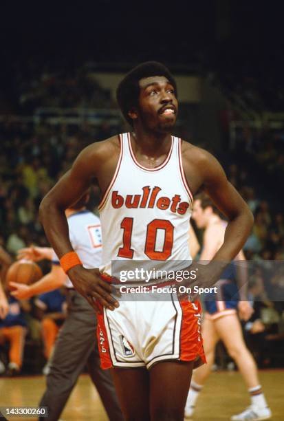 Earl Monroe of the Baltimore Bullets looks on against the New York Knicks during an NBA basketball game circa 1969 at the Baltimore Coliseum in...