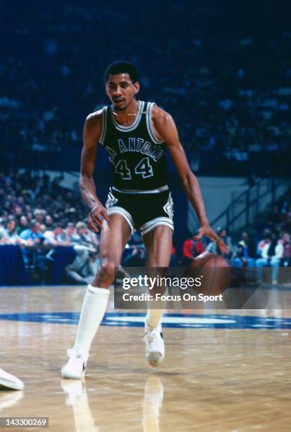 George Gervin of the San Antonio Spurs dribbles the ball up court against the Washington Bullets during an NBA basketball game circa 1978 at the...