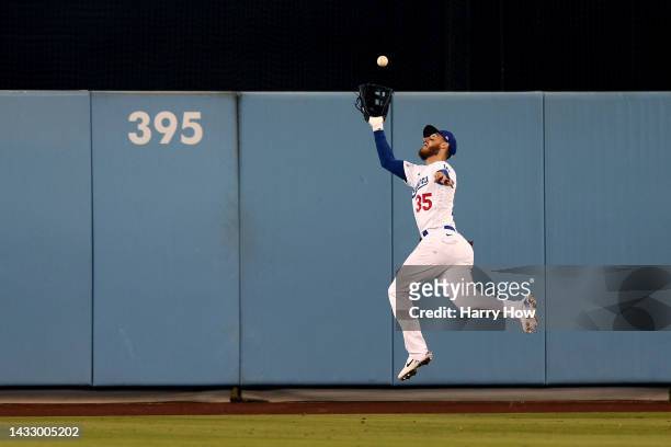 Cody Bellinger of the Los Angeles Dodgers makes a running catch on a hit by Austin Nola of the San Diego Padres for an out in the sixth inning in...