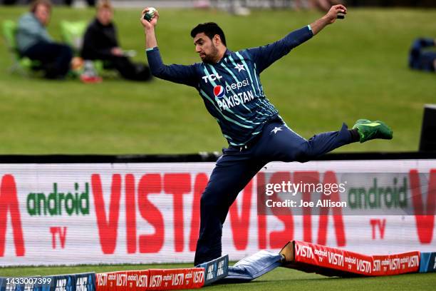 Haider Ali of Pakistan takes a catch as he falls outside the boundary during game six of the T20 International series between Bangladesh and Pakistan...