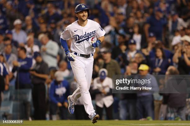 Trea Turner of the Los Angeles Dodgers reacts to his solo home run in the third inning in game two of the National League Division Series against the...