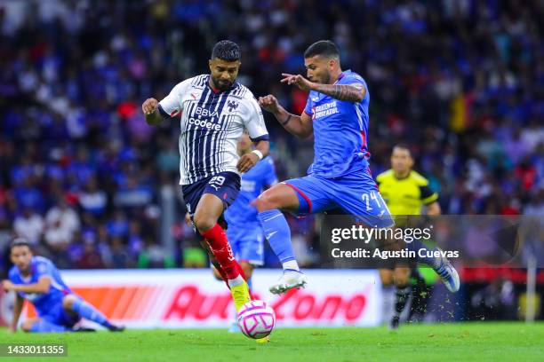 Rodrigo Aguirre of Monterrey fights for the ball with Juan Escobar of Cruz Azul during the quarterfinals first leg match between Cruz Azul and...