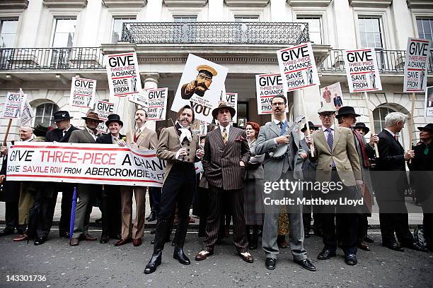 Well dressed demonstrators, organised by the satirical gentlemans publication Chap Magazine, protest on St George's day outside the Abercrombie &...
