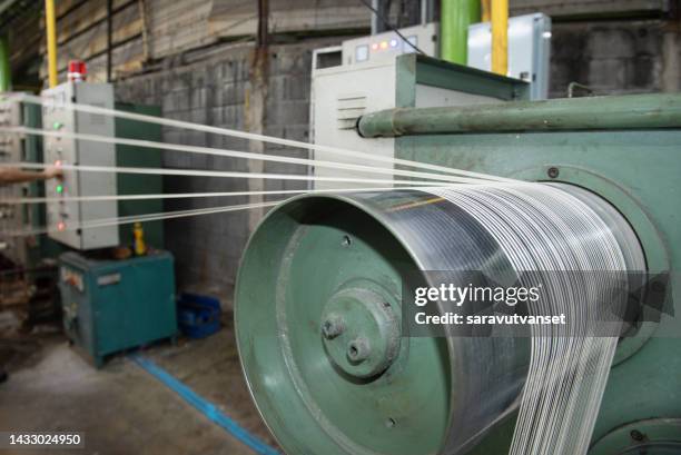 textile coils and rope, textile machine - polyester stock-fotos und bilder