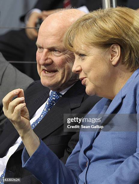 Ferdinand Piech , Chairman of the Supervisory Board of Volkswagen, and German Chancellor Angela Merkel attend a signing of aggrements between...