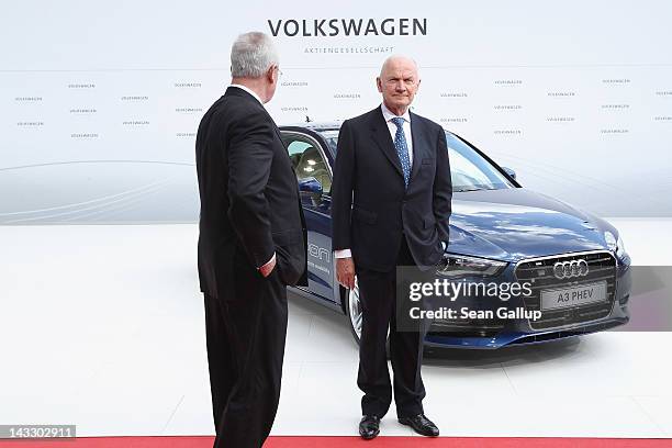 Volkswagen Chairman of the Supervisory Board Ferdinand Piech and Volkswagen CEO Martin Winterkorn stand next to an Audi A3 electric car while waiting...