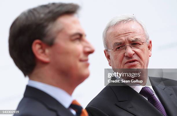 Lower Saxony Governor David McAllister and Volkswagen CEO Martin Winterkorn chat while waiting for the arrival of Chinese Premier Wen Jiabao at the...