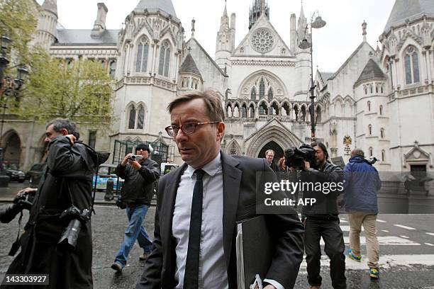 Sky News head John Ryley leaves the High Court after giving evidence at the Leveson Inquiry into press ethics in London, on April 23, 2012. Britain's...