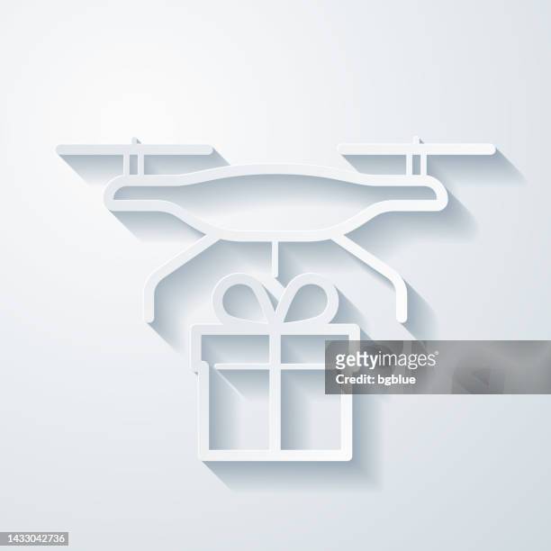 stockillustraties, clipart, cartoons en iconen met delivery drone with gift. icon with paper cut effect on blank background - jubileum werk
