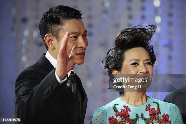 Hong Kong actors Andy Lau and Deanie Ip arrive for the red carpet of 2nd Beijing International Film Festival at China National Convention Center on...