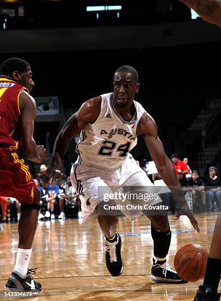 Flip Murray of the Austin Toros drives around Trent Strickland of the Canton Charge in game three of the 2012 NBA Development League Semifinals...