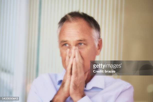 middle aged man - nose bleed stock pictures, royalty-free photos & images