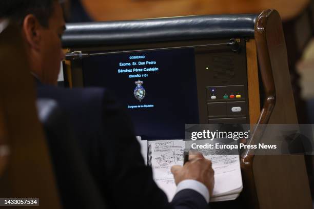 Prime Minister Pedro Sanchez points notes during a plenary session at the Congress of Deputies, Oct. 13 in Madrid, Spain. The President of the...