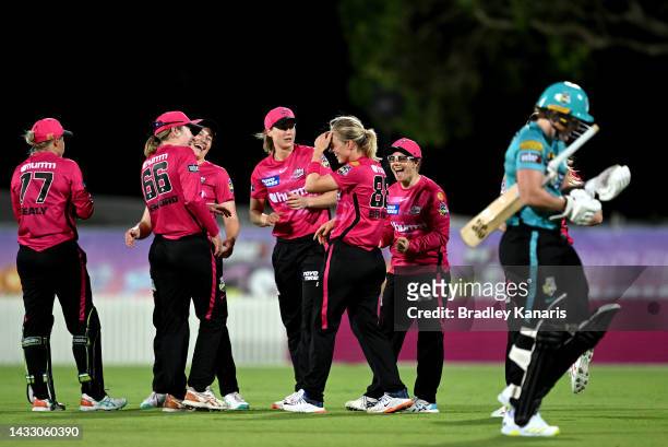 Maitlan Brown of the Sixers celebrates taking the wicket of Laura Harris of the Heat during the Women's Big Bash League match between the Brisbane...