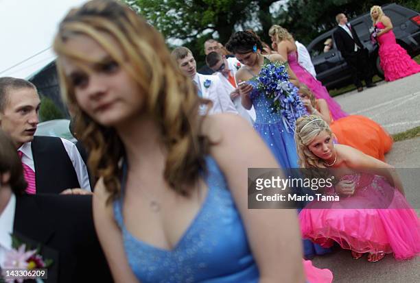 Students wait to enter outside the Owsley County High School prom on April 21, 2012 in Booneville, Kentucky. Daniel Boone once camped in the...