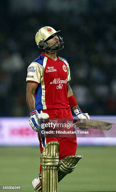 Royal Challengers Bangalore batsman Virat Kohli disappointed after getting out during the IPL 5 T20 cricket match played between Rajasthan Royals and...