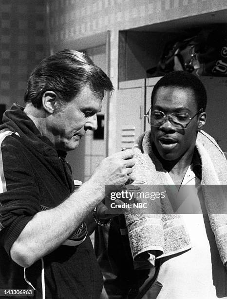 Episode 18 - Pictured: Robert Culp as Kelly, Eddie Murphy as Bill Cosby during the 'Tennis Club Locker Room' skit on April 24, 1982 - Photo by: