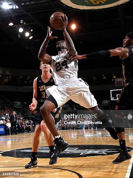 Flip Murray of the Austin Toros drives into the lane while shooting against the Erie BayHawks in game three of the NDBL Playoffs on April 16, 2012 at...