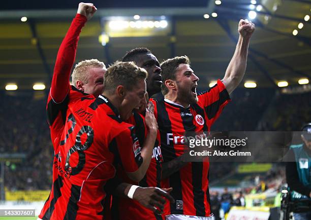 Mohamadou Idrissou of Frankfurt celebrates his team's second goal with team mates Sonny Kittel and Heiko Butscher during the Second Bundesliga match...