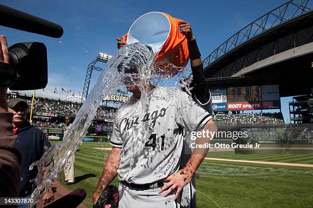 Starting pitcher Philip Humber of the Chicago White Sox is doused with water by Alexei Ramirez after throwing a perfect game against the Seattle...