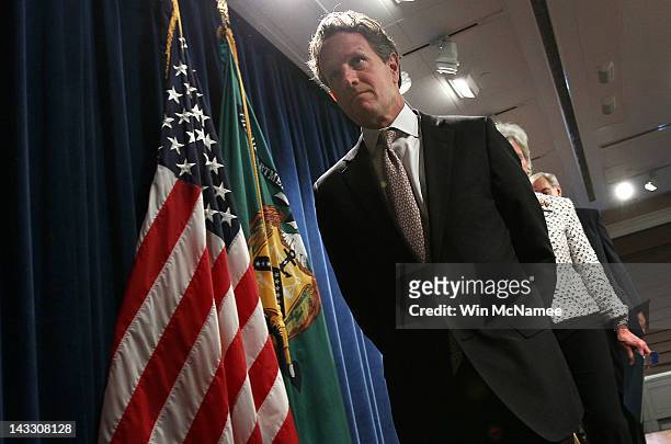 Treasury Secretary Timothy Geithner departs a briefing releasing Social Security and Medicare trustees reports at the Treasury Department April 23,...